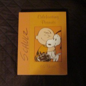 Celebrating Peanuts 65 years book,  new never read, Snoopy comics, collector's